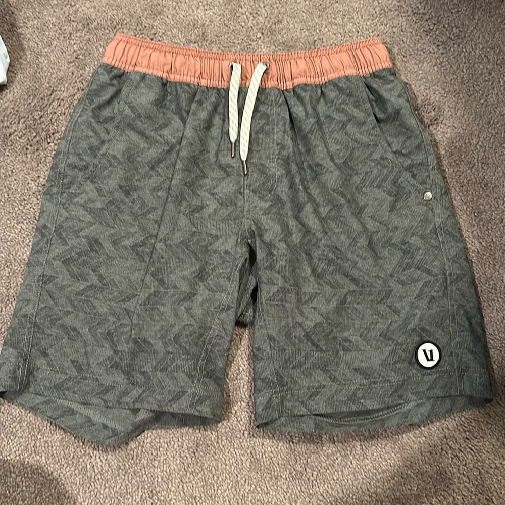 Vuori shorts WITH liner around 5” seam. Hardly worn, too small